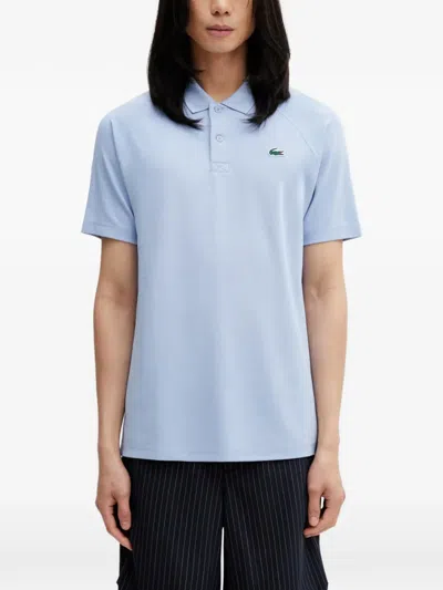 Lacoste Logo-patch Raglan-sleeve Polo Shirt In Blue