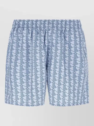 Lacoste Monogram Swim Shorts Featuring Side Pockets In Blue