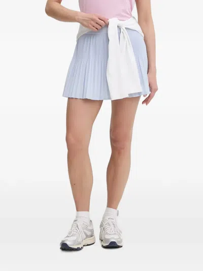 Lacoste Pleated Logo-patch Mini Skirt In Blue
