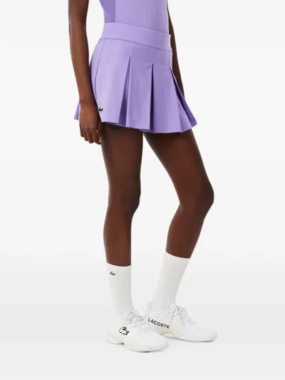 Lacoste Pleated Logo-patch Tennis Mini Skirt In Purple