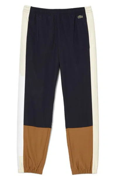 Lacoste Regular Fit Colorblock Athletic Pants In Rhi Abimes/cookie-laponie