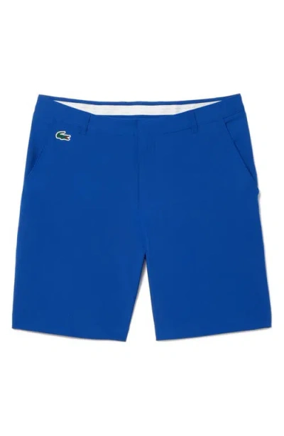 Lacoste Men's Golf Performance 8" Bermuda Shorts In Blue