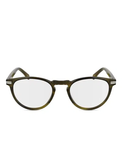 Lacoste Striped Round Glasses In Yellow