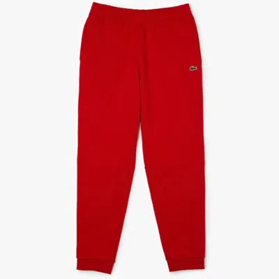 Lacoste Tapered Fit Fleece Trackpants In Red