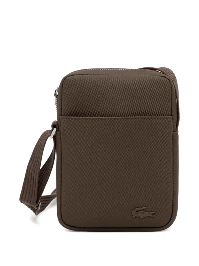 Lacoste Textured Logo Cross Body Bag In Brown