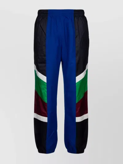 Lacoste Trousers In Color-block Design With Elastic Cuffs