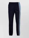 Lacoste Trousers With Elastic Cuffs And Side Stripe