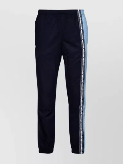 Lacoste Trousers With Elastic Cuffs And Side Stripe