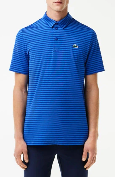 Lacoste Ultradry Stripe Performance Golf Polo In Capitaine/ Ladigue