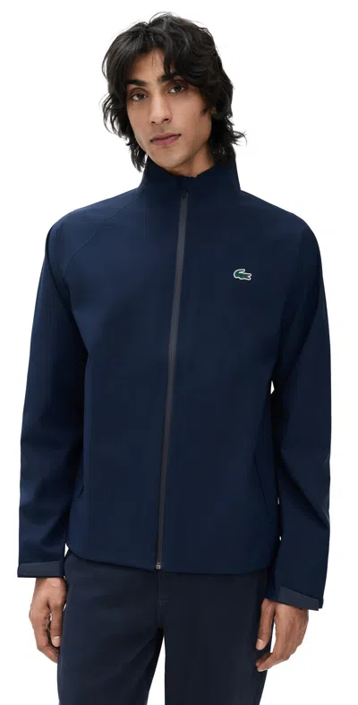 LACOSTE WATER REPELLENT GOLF WINDBREAKER MARINE/MARINE