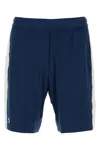 Lacoste Striped Elastic Waistband Shorts With Side Stripes In Blue