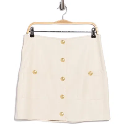 L'agence Truman Snap Faux Leather Miniskirt In White