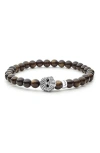 Lagos Anthem Golden Obsidian Skull Stretch Bracelet In Gold Obsidian
