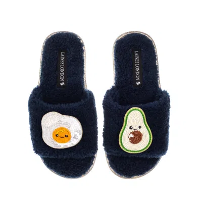 Laines London Women's Blue Teddy Slider Slippers With Laines Loveables Egg & Avocado Brooches - Navy