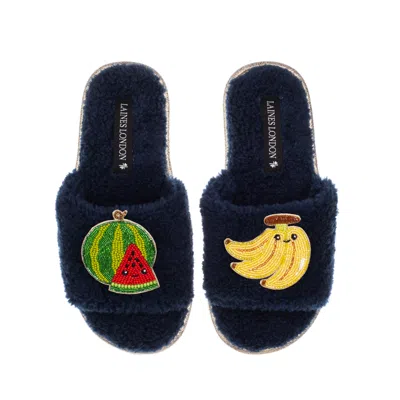 Laines London Women's Blue Teddy Slider Slippers With Laines Loveables Watermelon & Banana Brooches - Navy