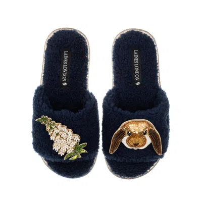 Laines London Women's Blue Teddy Toweling Slipper Sliders With Bunny & White Foxglove Flower Brooches - Navy