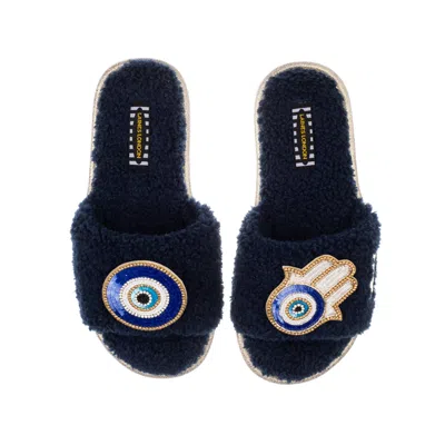 Laines London Women's Blue Teddy Towelling Slipper Sliders With Evil Eye & Hamsa Hand Brooches - Navy