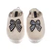 Laines London Women's Gold / Neutrals / White Flatform Cloud Slippers With Black Stripe Bow Brooches - Cream In Multi