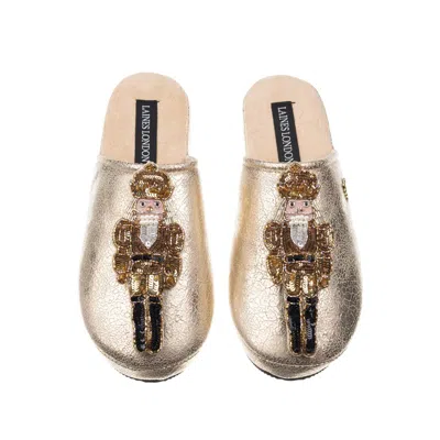 Laines London Women's Gold Softie Slippers With Christmas Double Gold Grand Nutcrackers Brooches