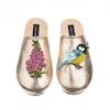 Laines London Women's  Gold Softie Slipper With Pink Foxglove Flowers & Blue Tit Brooches In Gold