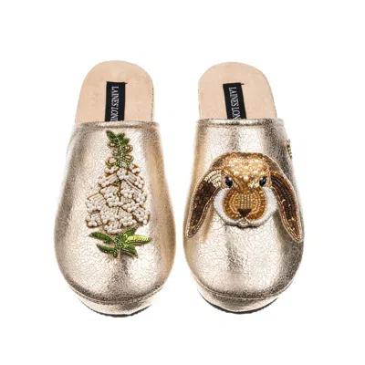 Laines London Women's  Gold Softie Slippers With White Foxglove Flowers & Bunny Brooches