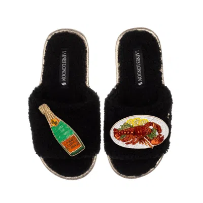 Laines London Women's Teddy Toweling Slipper Sliders With Lobster Platter & Champagne Bottle Brooches - Black