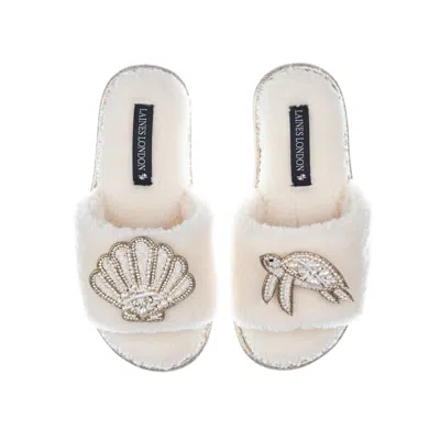 Laines London Women's White Teddy Toweling Slipper Sliders With Beaded Shell & Turtle Brooches - Cream