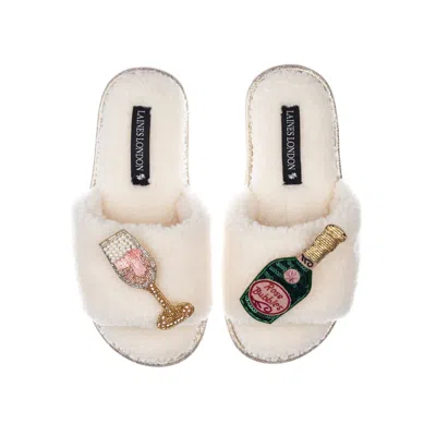 Laines London Women's White Teddy Towelling Slipper Sliders With Pink Champagne Brooches - Cream