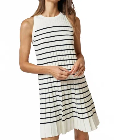 Lalavon Striped Pleated Sleeveless Sweater Mini Dress In White With Black Stripes