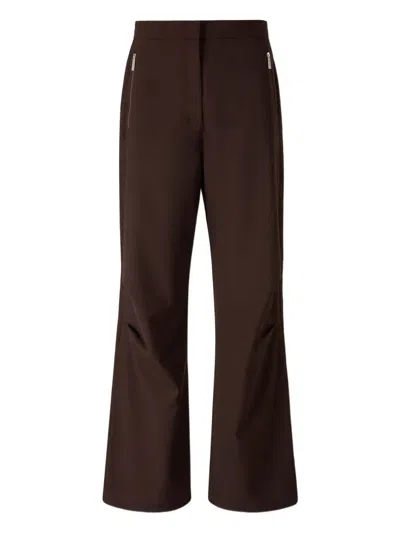 LAMINAR ZIP-POCKET FLARED TROUSERS