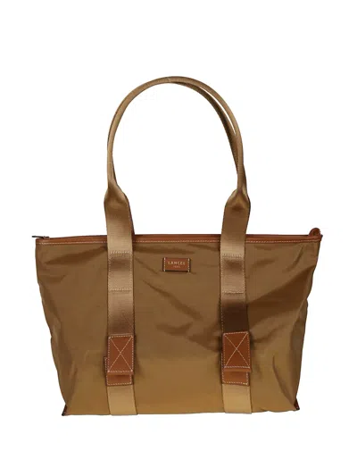 Lancel Logo-plaque Leather-trim Tote Bag In Brown