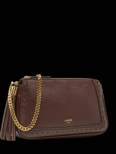 Lancel Premier Flirt Tassel-detail Whipstitch-trim Clutch Bag In Brown