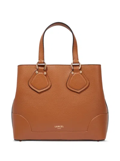 Lancel Small Neo Izy De Lancer Leather Tote Bag In Braun