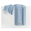 Lands Downunder Sutton Plaid Throw In Blue