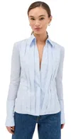 Laquan Smith Fitted Button Down With Peplum And Pleated Shoulder With Exagerated Cuff Sky In Sky