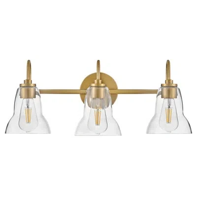 Lark Vera 3-light Bath Vanity Fixture With Clear Bell-shaped Glass In Lacquered Brass