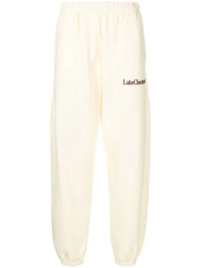 LATE CHECKOUT EMBROIDERED-LOGO TRACK PANTS