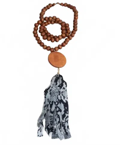 Lauren Lane Women's Print Wooden Bead Tassel Necklace In Brown Snake In Orange
