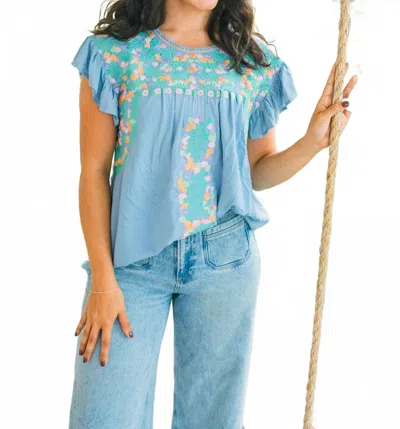 Layerz Clothing Addie Embroidered Tunic Top In Baby Blue Pastel Multi
