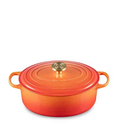 Le Creuset Cast Iron Flamme Dorée Oval Casserole Dish In Orange