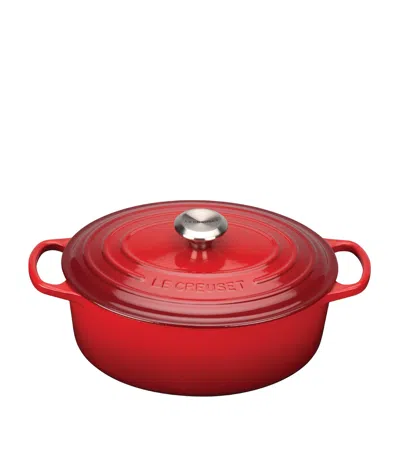 Le Creuset Ise Signature Oval Cast-iron Casserole Dish In Cerise