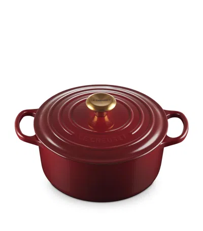 Le Creuset Cast Iron Round Casserole Dish In Burgundy
