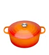 Le Creuset Cast Iron Round Casserole Dish In Orange
