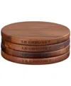 Le Creuset Set Of 4 Magnetic Round Wooden Trivets In Wood