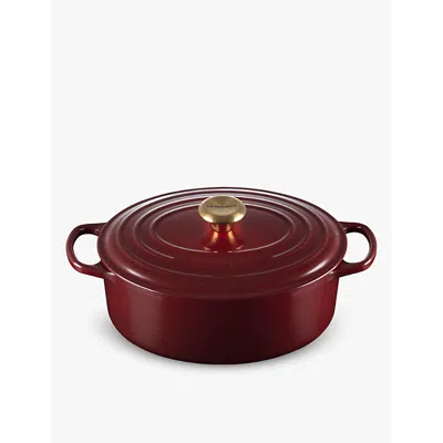 Le Creuset Rhone Signature Oval Cast-iron Casserole Dish In Garnet