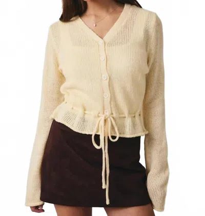 Le Lis Peplum Cardigan In Butter In Yellow