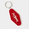 Le Specs Keyring In Red