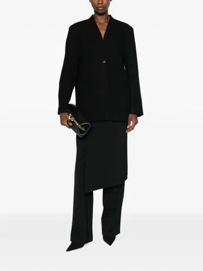 Le Sully Studio Single-breasted Collarless Coat In Black