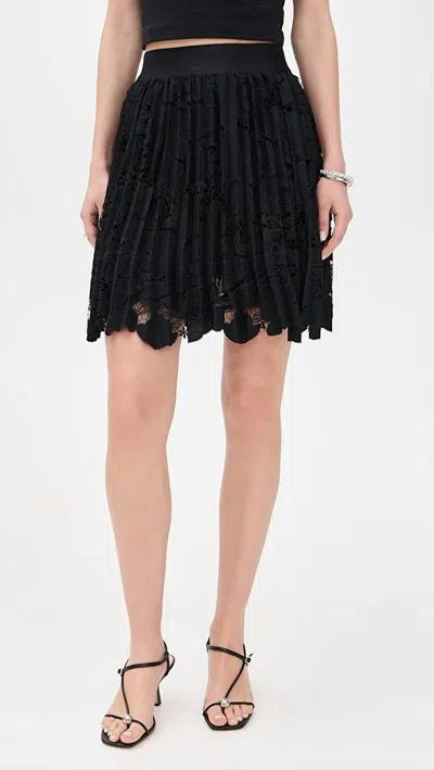 LE SUPERBE MINI PLEATED SKIRT IN BLACK