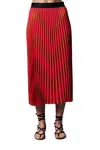 LE SUPERBE PLEATED MIDI SKIRT IN PINK RED CHEVRON